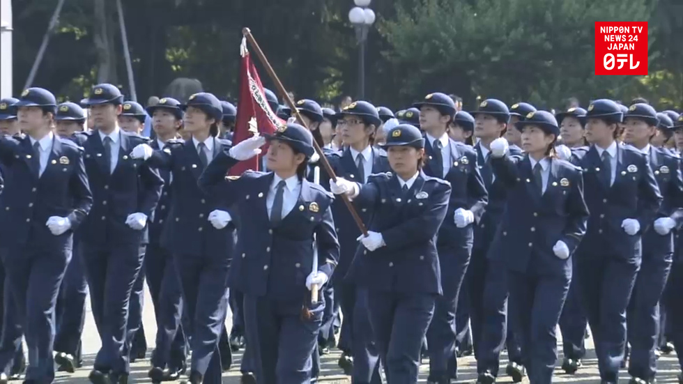 Japanese riot police march