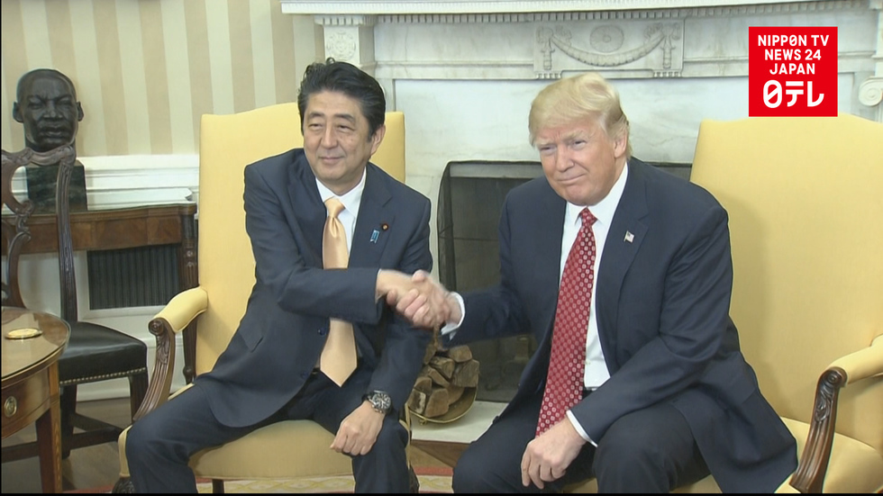 Abe, Trump hold confidential talks
