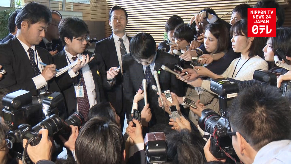 Abe apologizes after cabinet minister's resignation 