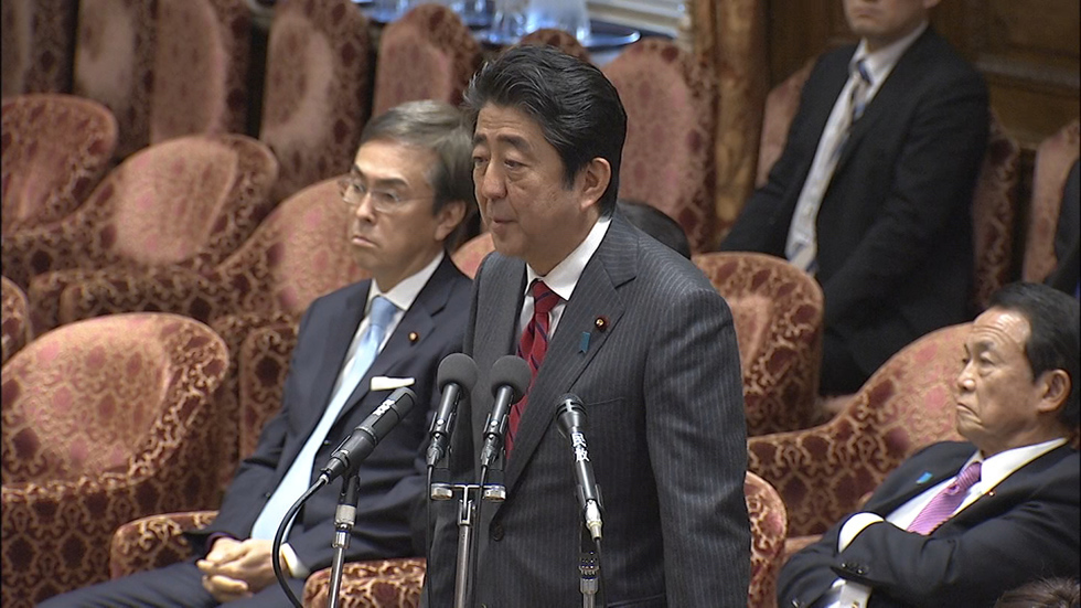 Abe defends close ties with Trump