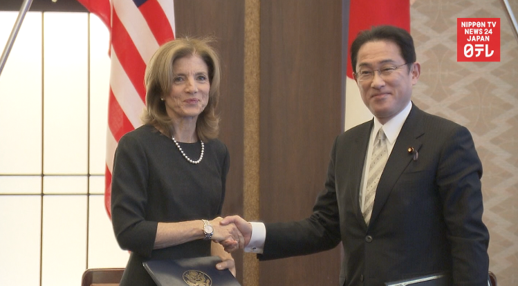 Kennedy signs pact to cut US base-linked crime 