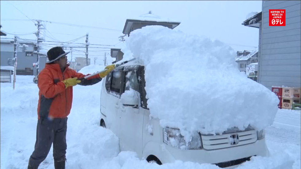 Snow claims woman, people gird for more