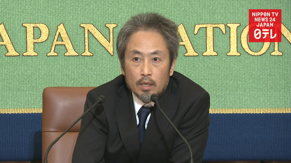 Freed Japanese journalist meets press