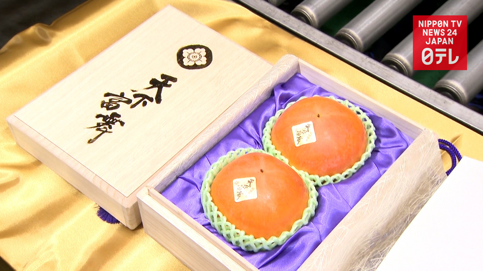 2 persimmons fetch $4800 