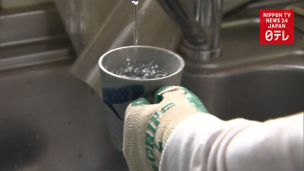 Flooded town restores water supply