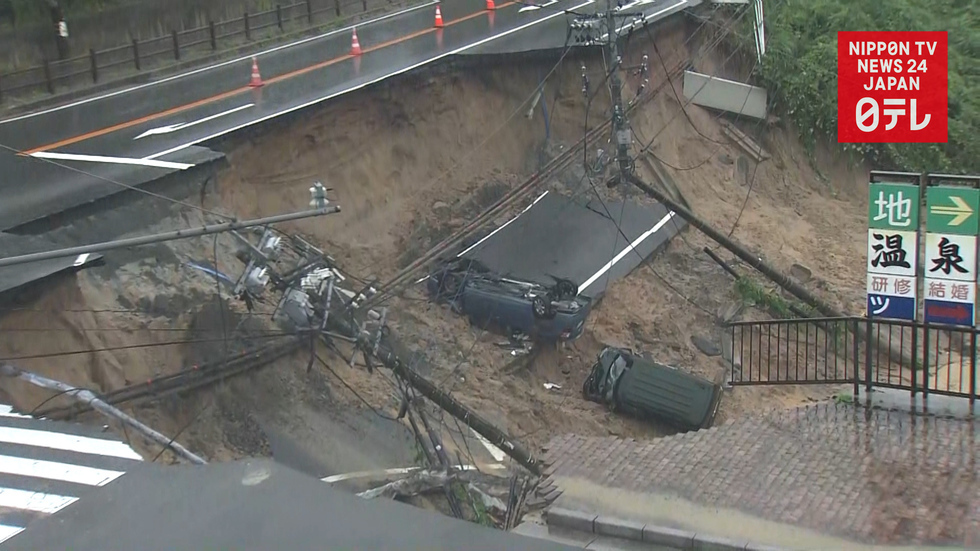Heavy rain triggers road collapse and landslide