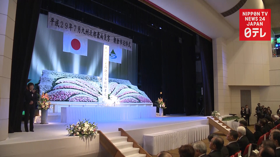 Kyushu residents mark year since deadly rains