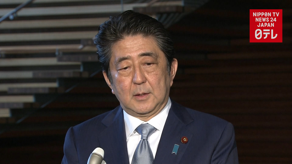 Abe congratulates Trump on release of Americans 