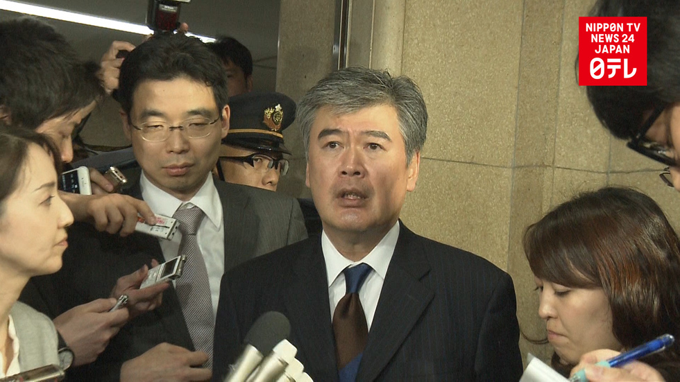 Abe govt ok's resignation of top finance official  