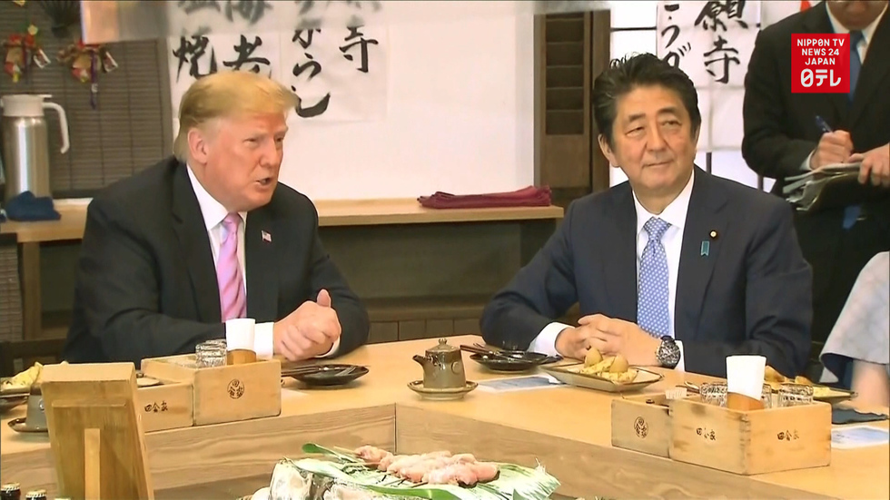 Abe, Trump talk over dinner