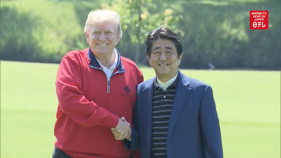 Abe, Trump play golf