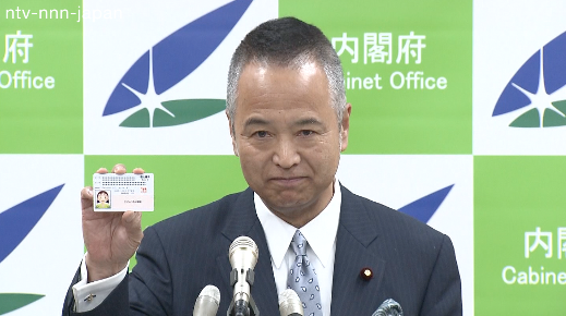 Economy minister promotes number ID in song