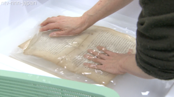 Tsunami books restored and exhibited in Tokyo