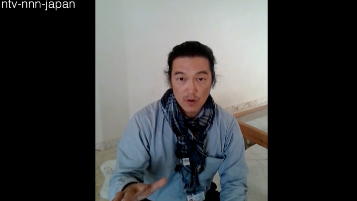 Japan awaits news on hostage