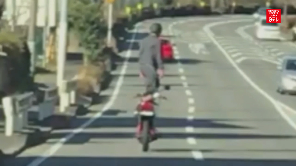 Rider stands up while driving