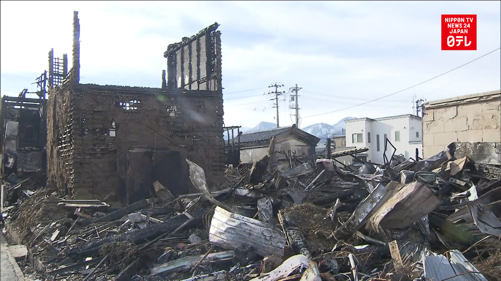 Post-blaze recovery as main street reopens