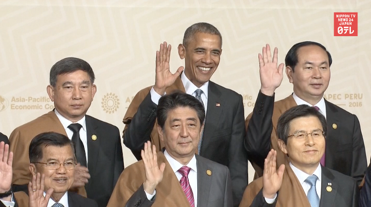 Abe chats with Obama, Xi 