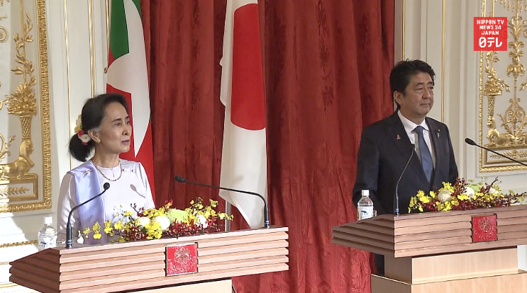 Abe meets Suu Kyi, pledges $8b for Myanmar