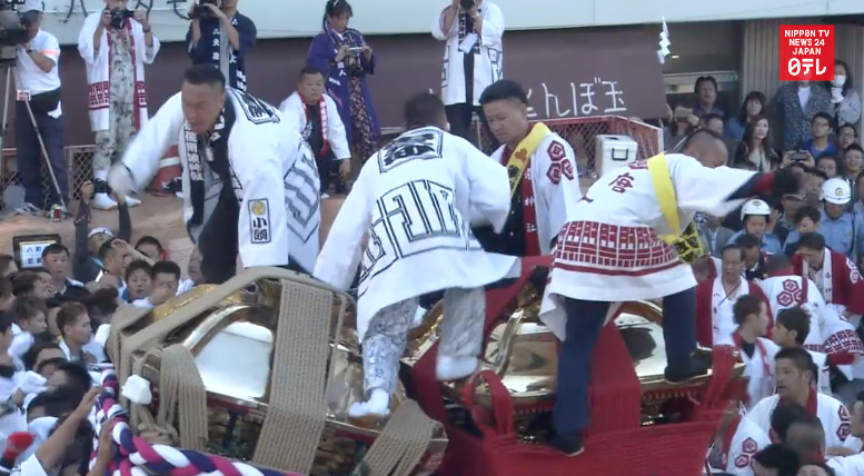 Portable shrines clash in festival climax