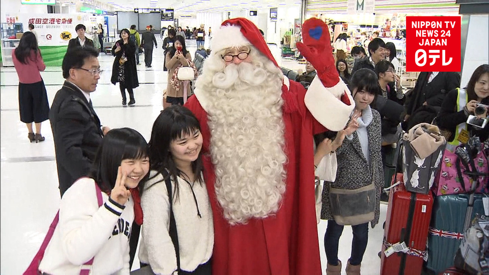 'Tis almost the season: Santa arrives spreading Christmas cheer